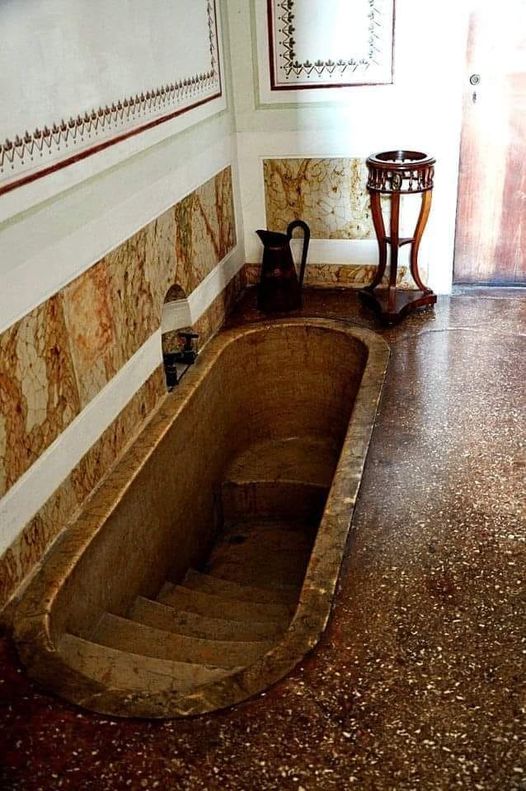 Napoleon’s bathroom with the recessed bath at his apartment in Villa Pisani at Stra, northern Italy.