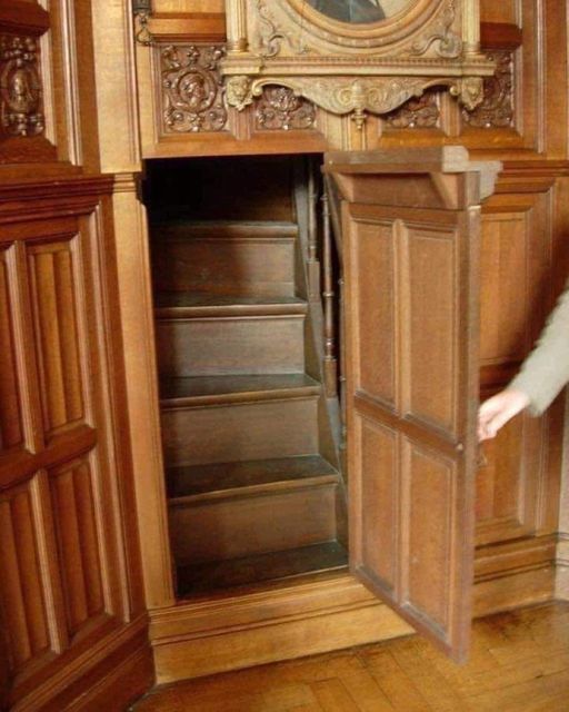 A hidden staircase leading to a secret room inside a 19th Century Victorian home