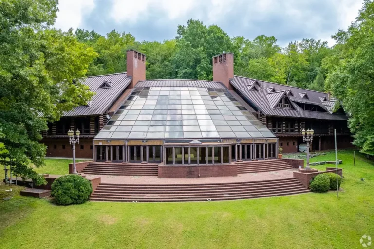 Barbara Mandrell’s deserted mega log mansion with bars, an indoor pool, and a shooting range.