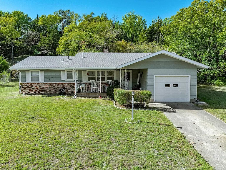 Charming Ranch-Style Home with Fireplace and Spacious Patio – Just $123,500!